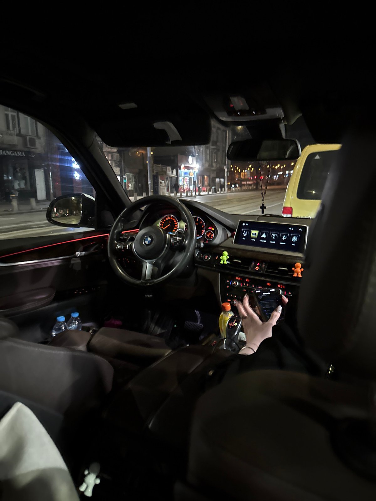 Driver documents BMW interior view on Sofia street