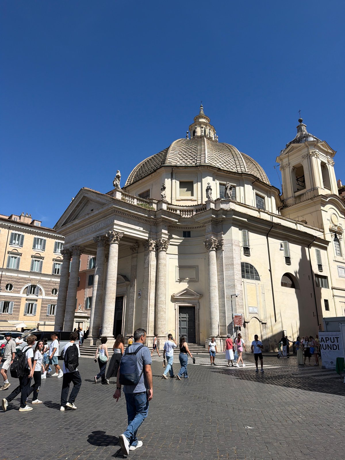 Tourist documents sunny afternoon stroll through historic Rome streets