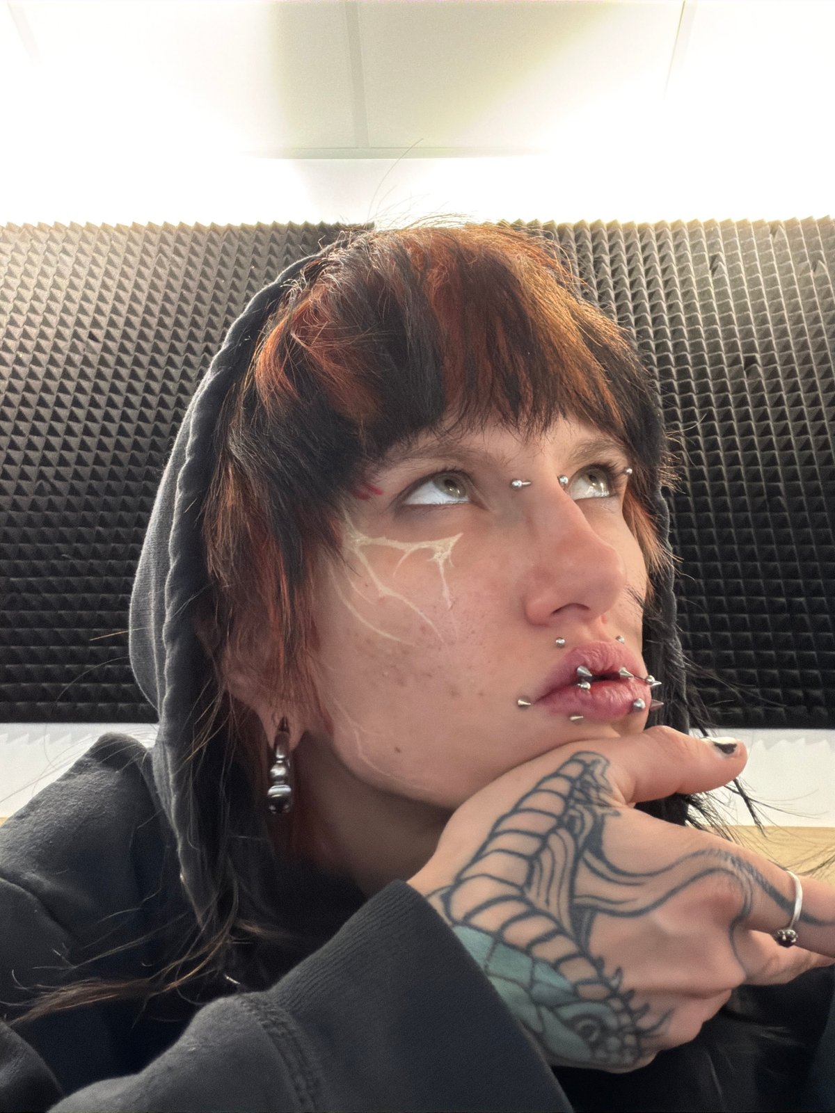 Close-up portraits of pierced individuals captured in Sofia