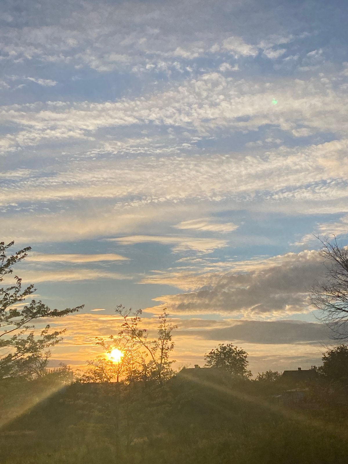 Rural landscape scenes documented during sunset period May 14