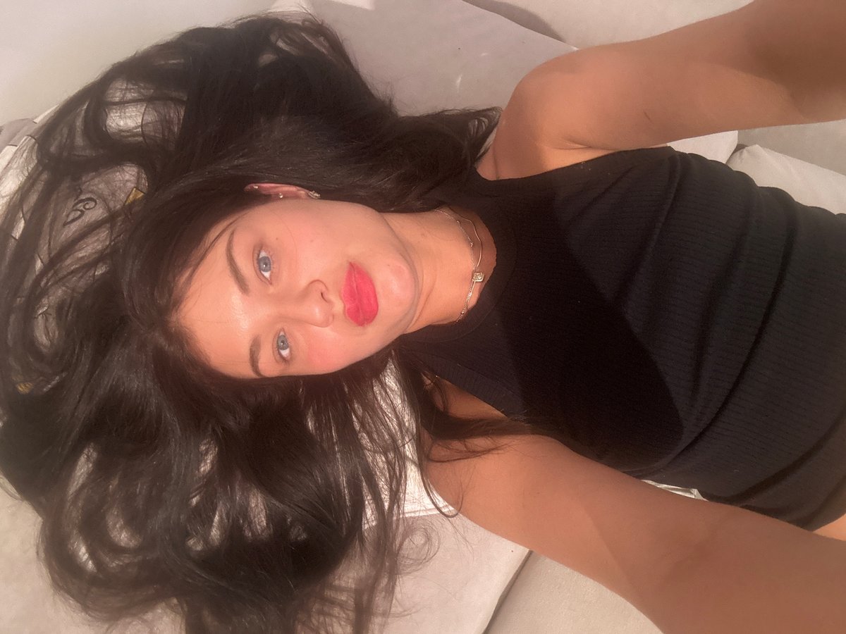 Woman takes selfie lying down in Moscow