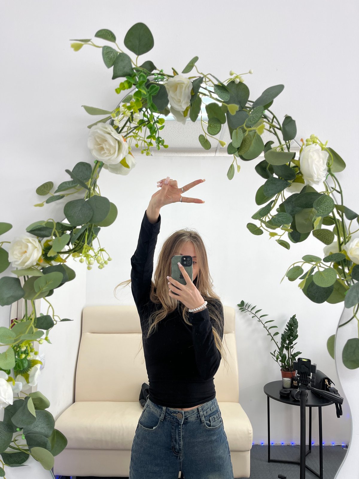 Young woman takes morning selfies at Russian nail salon