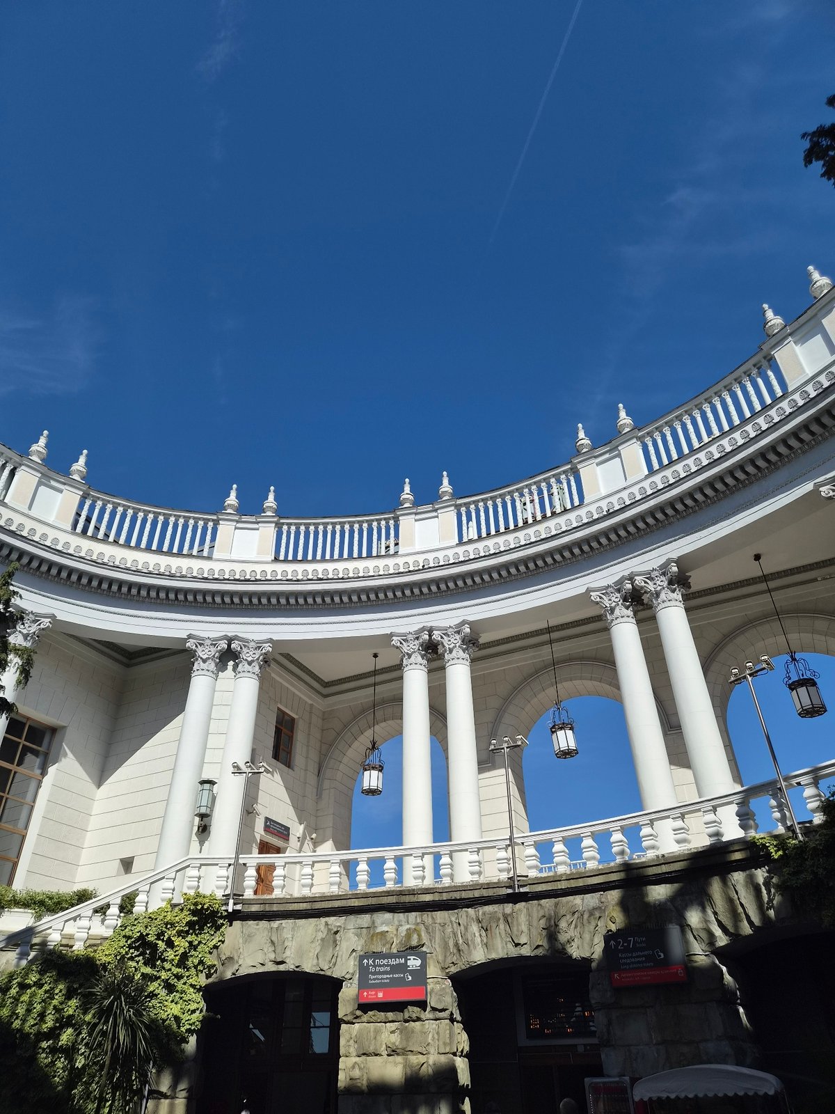 Visitor documents Sochi Railway Station architecture in upward views