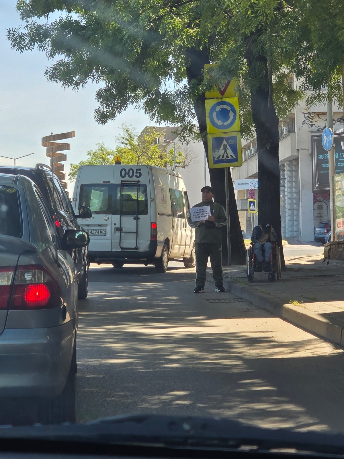 Street scenes documented in Plovdiv, Bulgaria featuring van and monuments