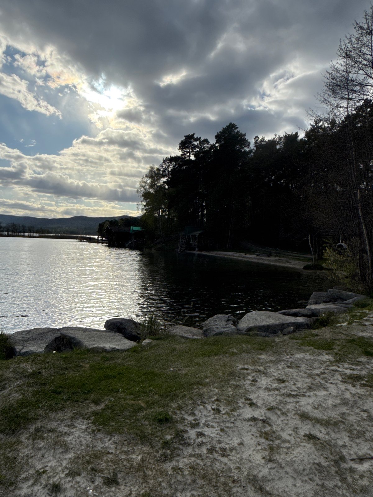 Tourist documents lakeside resort facilities at Zolotoi Plyazh, Russia