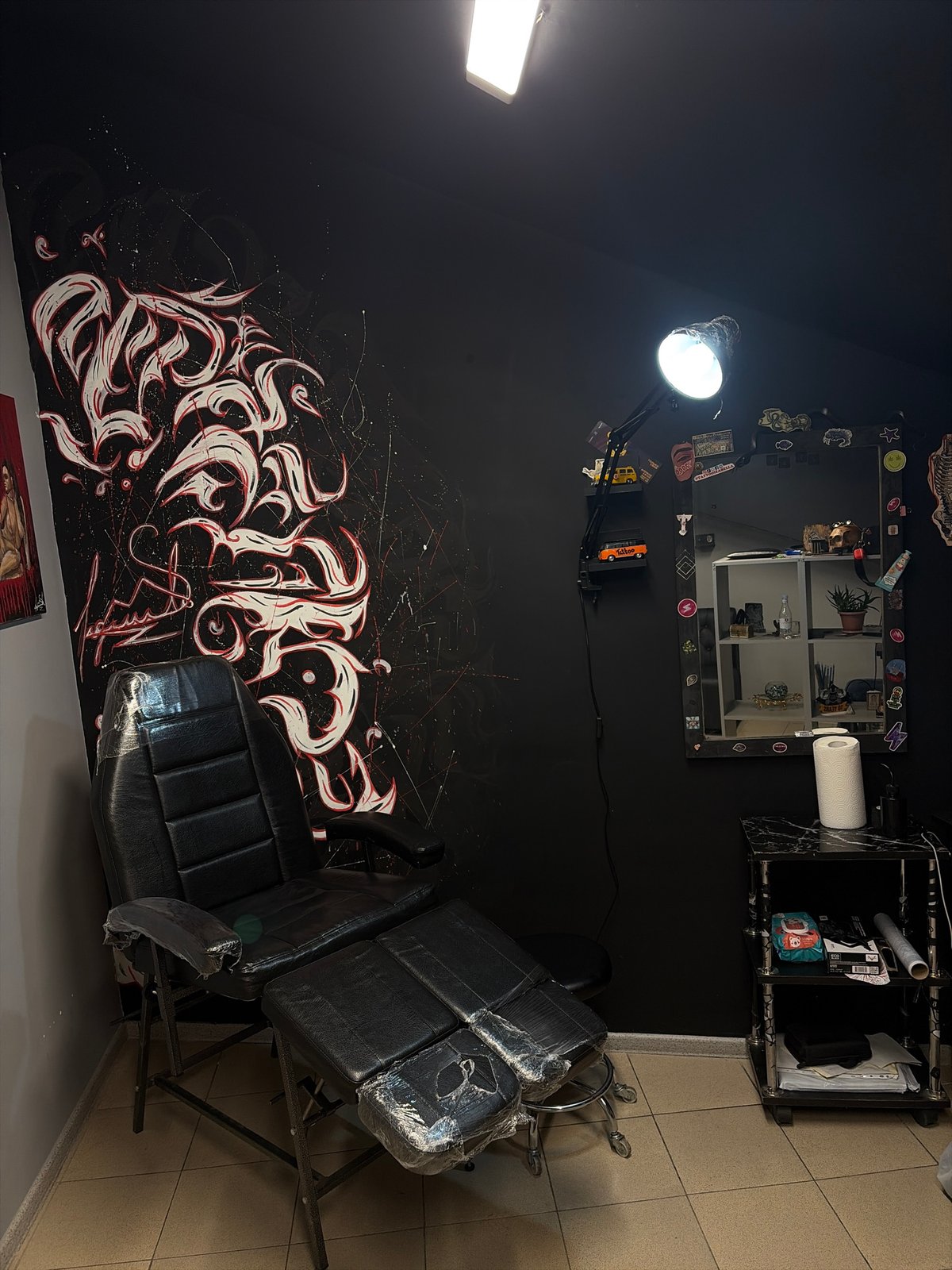 Tattoo studio interior and glassblower painting documented in Yerevan