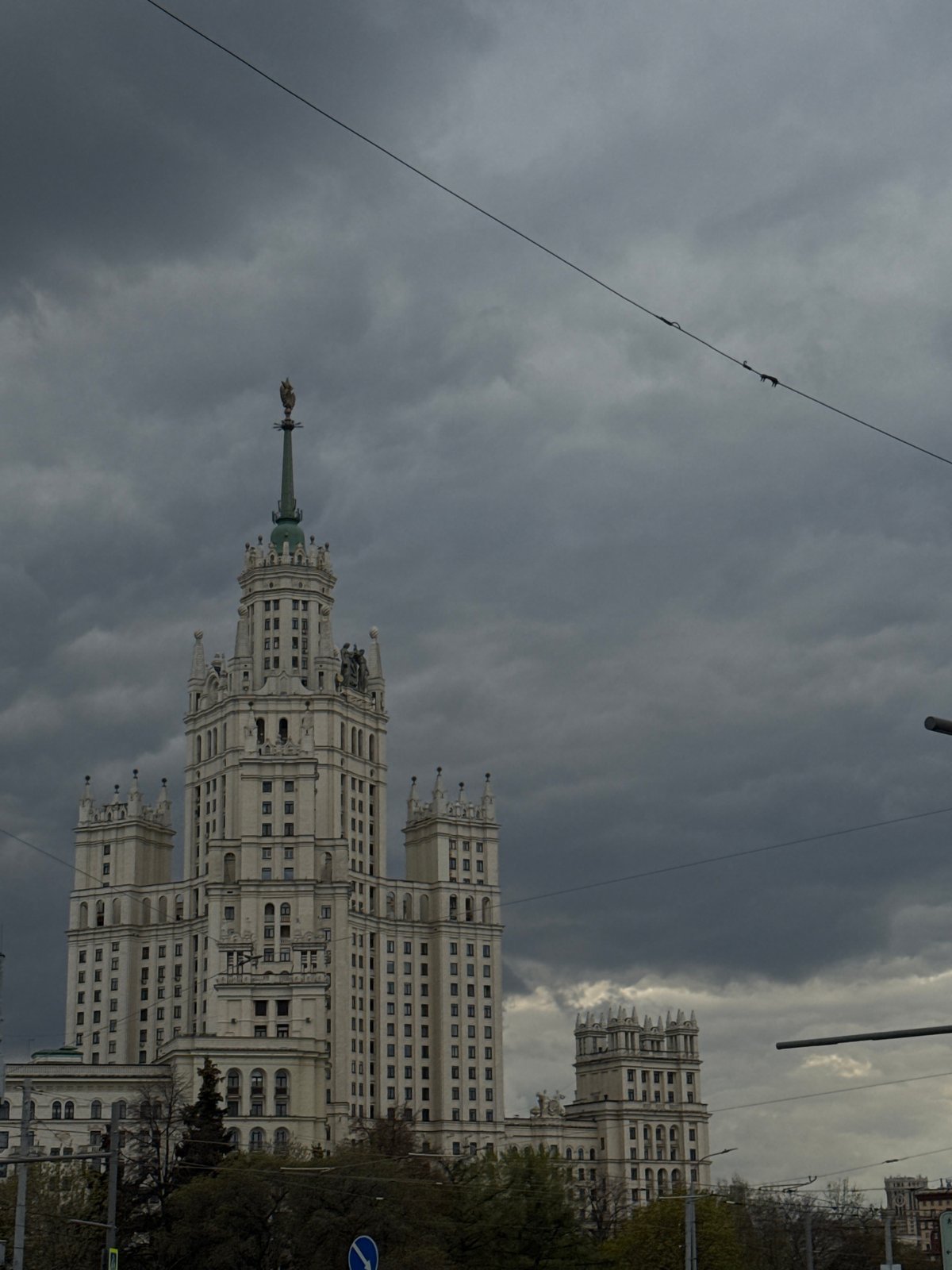 Moscow witness documents Stalinist skyscraper under overcast afternoon sky
