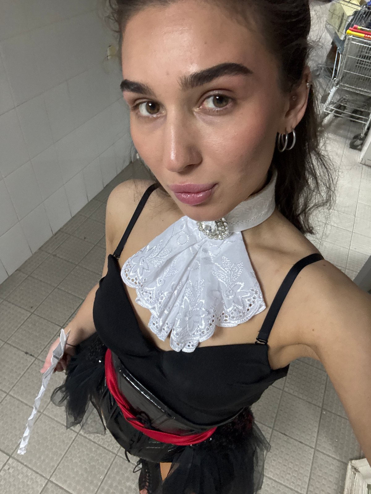 Performer documents costume preparations backstage in Kazan