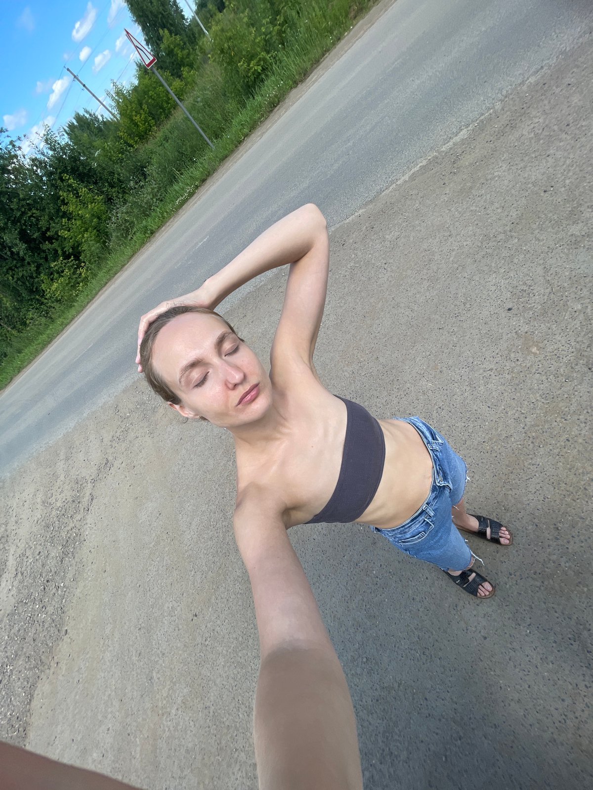Casual selfie moments on a summer morning in Kuyeda, Russia