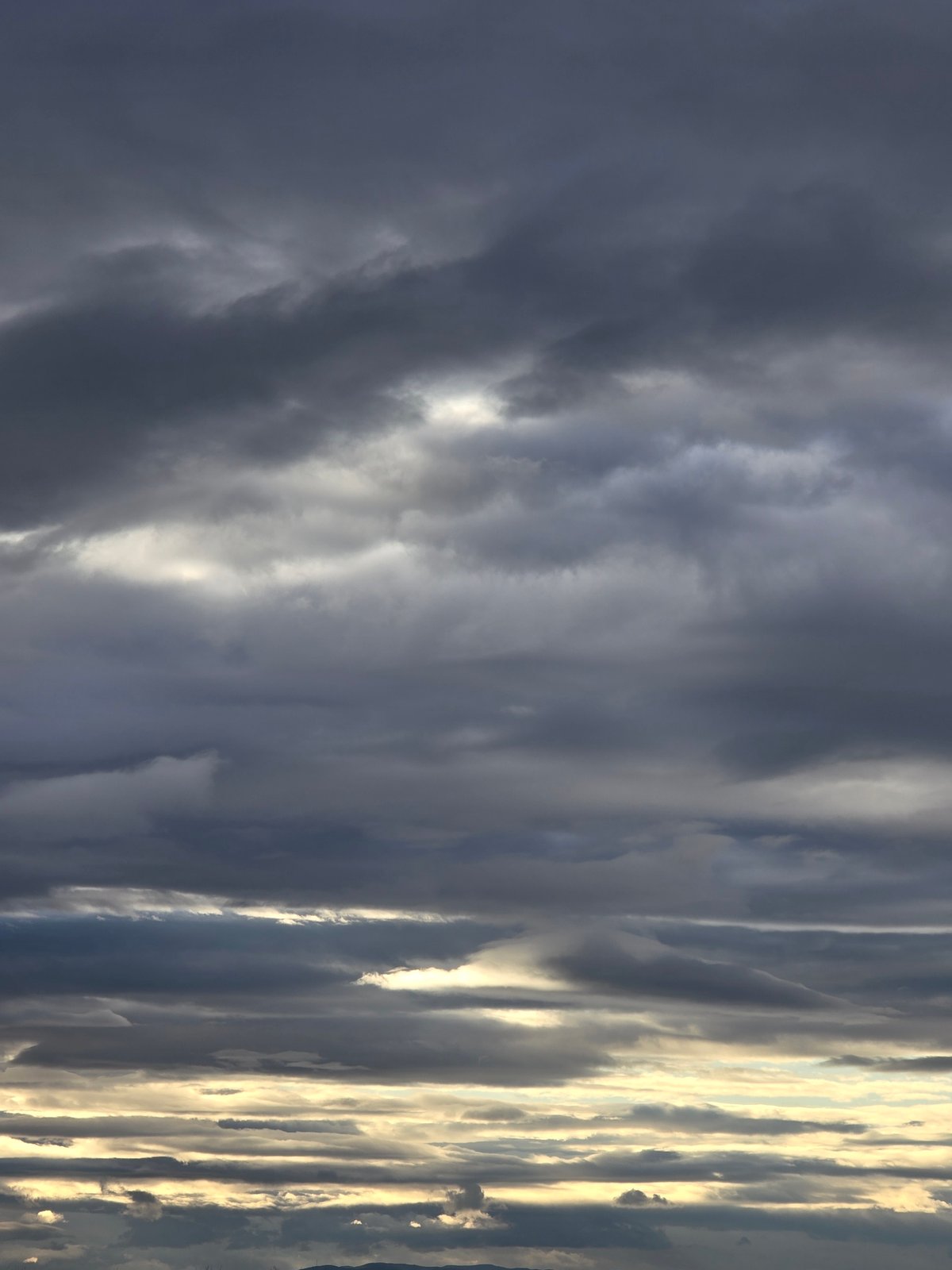 Overcast skies observed over urban neighborhood May 17