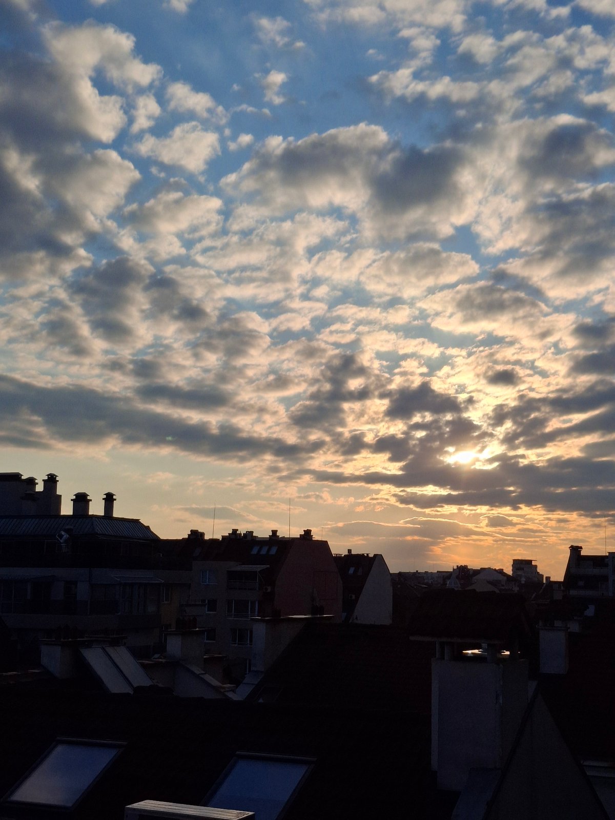 Golden sunset illuminates Sofia skyline from elevated viewpoint