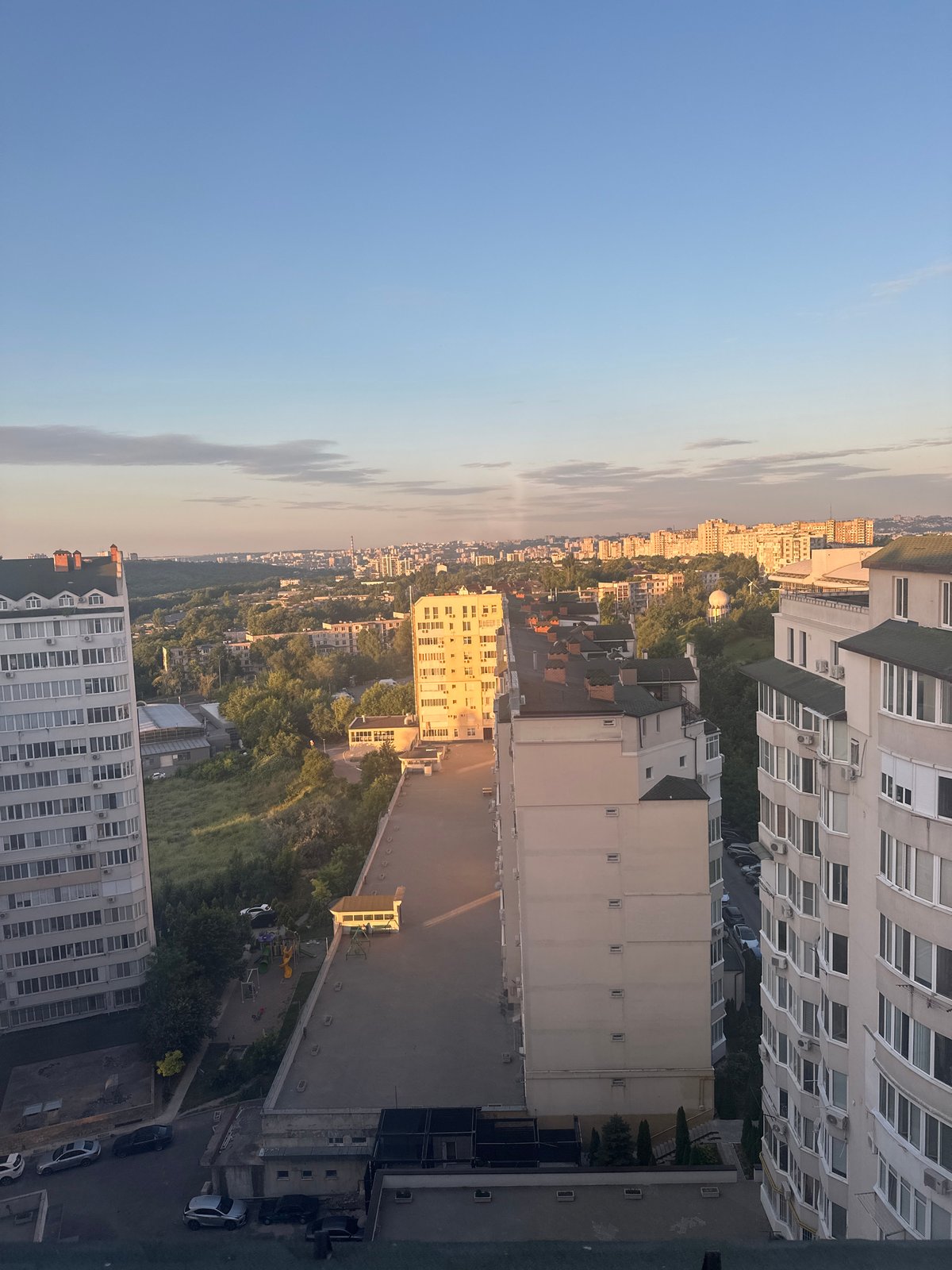 Golden hour aerial over Chișinău's residential neighborhoods