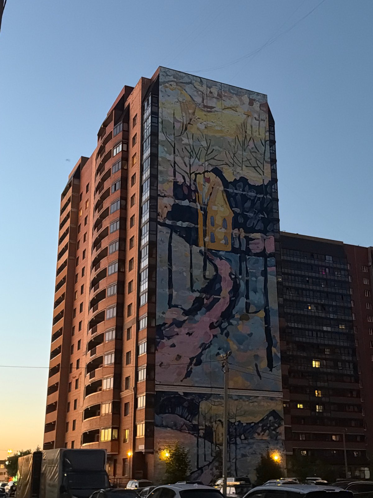 Mural building at dusk, a wrap being made, random shelf finds