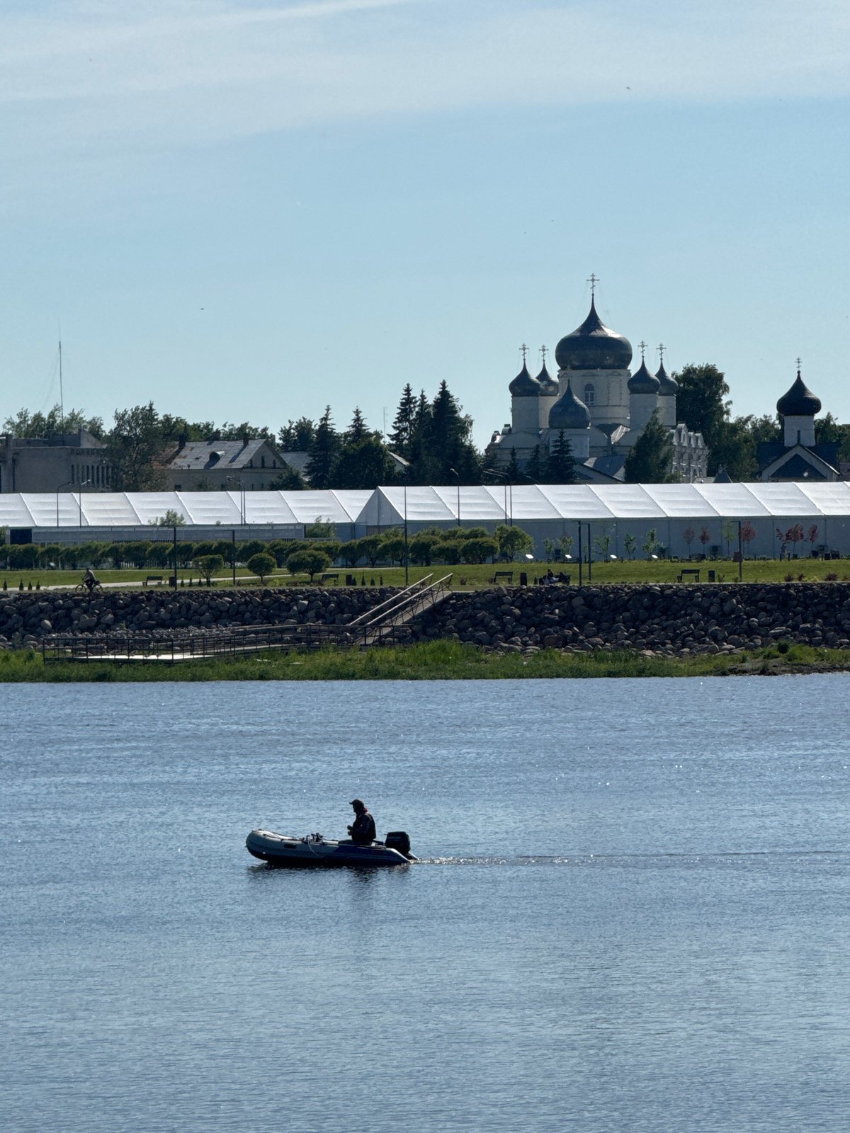 Tourist documents historic churches and spring blooms in Veliky Novgorod