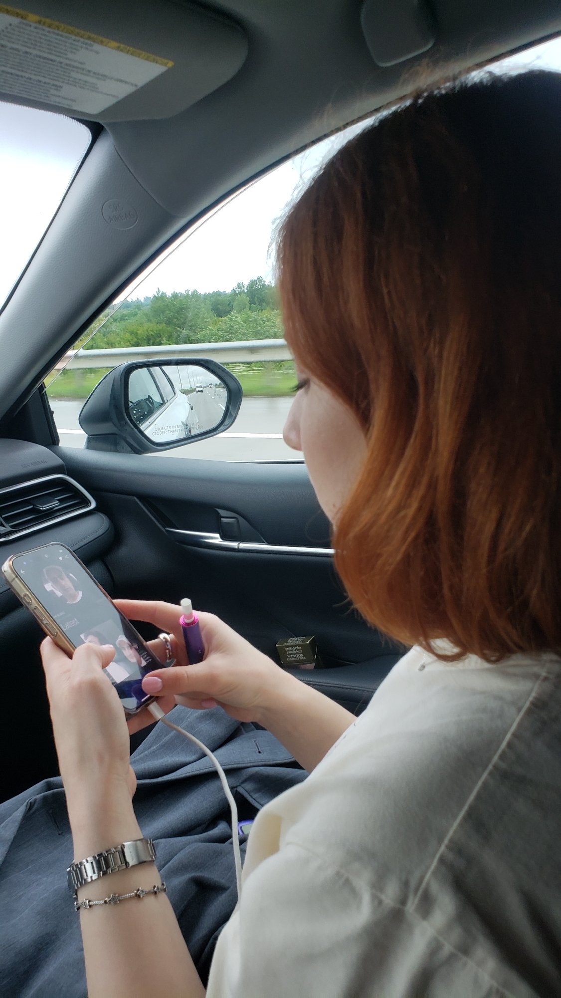 Woman passenger observed in moving vehicle near Geguti, Georgia