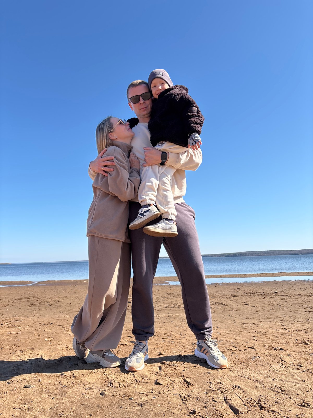 Family enjoys morning outing at Chaikovsky amusement park and lakeside