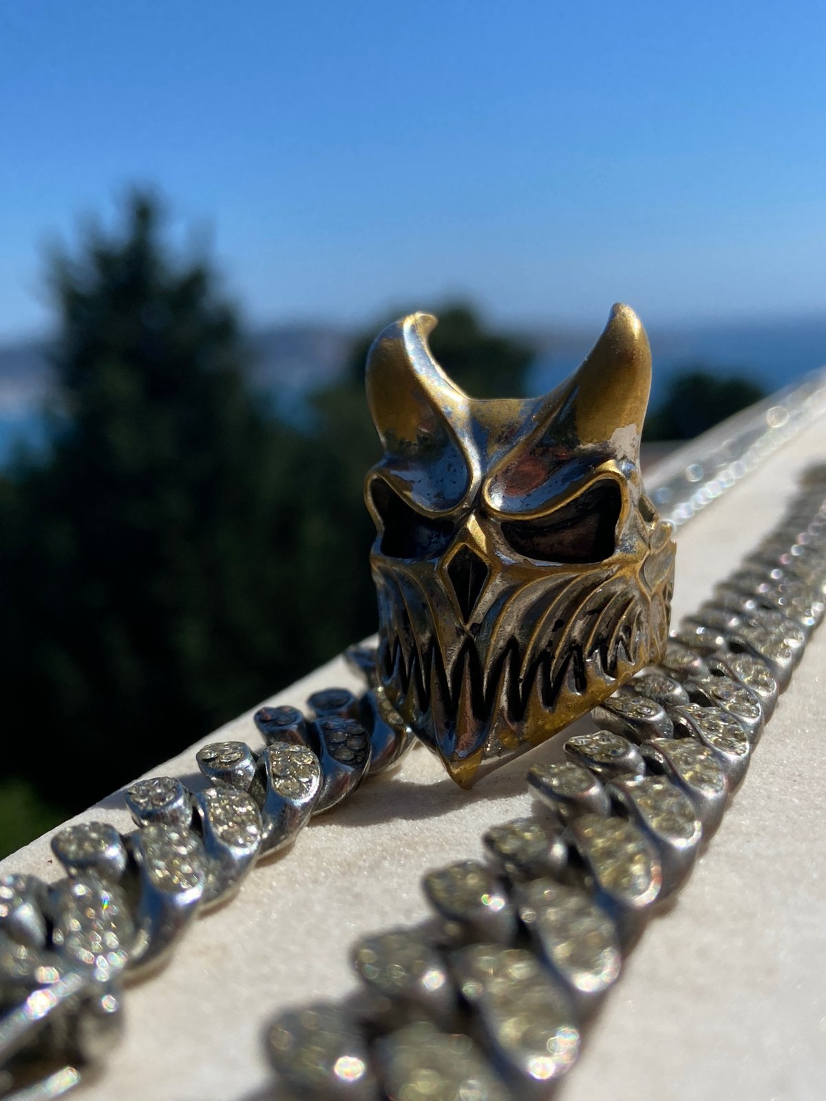 Man displays ornate jewelry collection during Montenegro selfie session