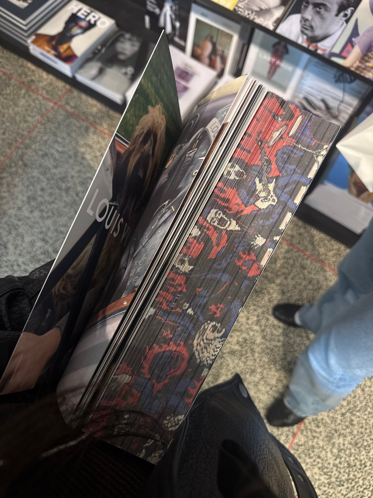 London shopper documents retail displays during afternoon browsing session