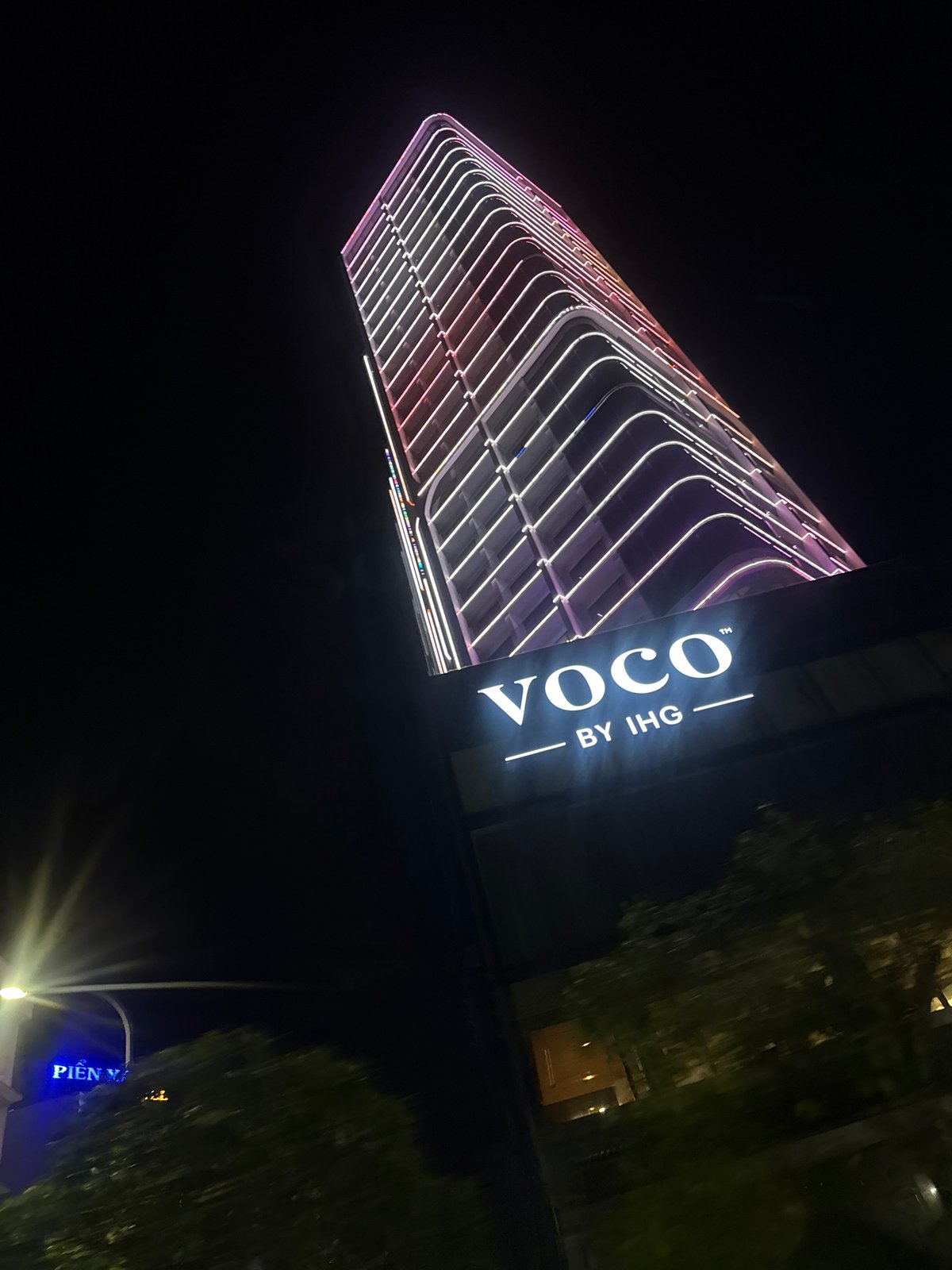 Evening food tour through illuminated Nha Trang streets