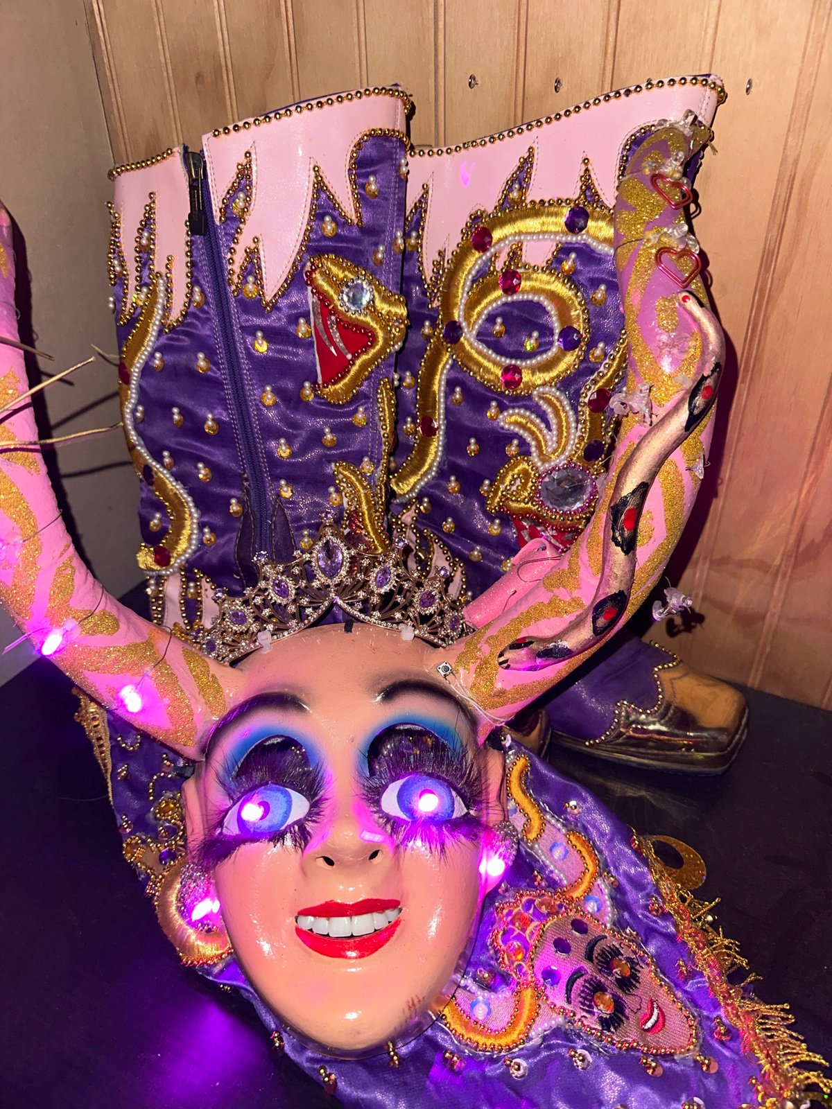 Costume doll with blue eyes spotted indoors in Arica
