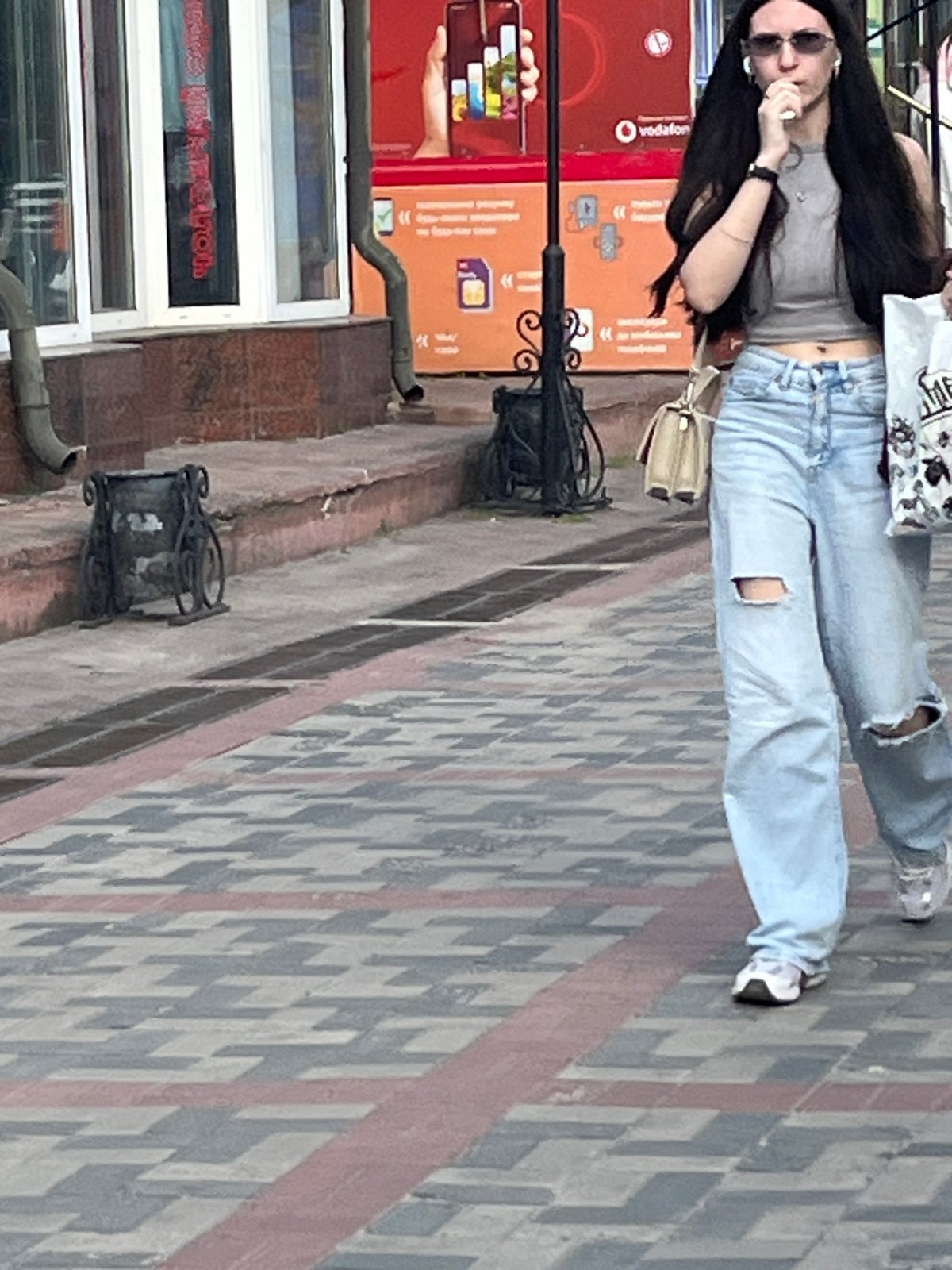 Summer afternoon street life and flowers in Dnipro