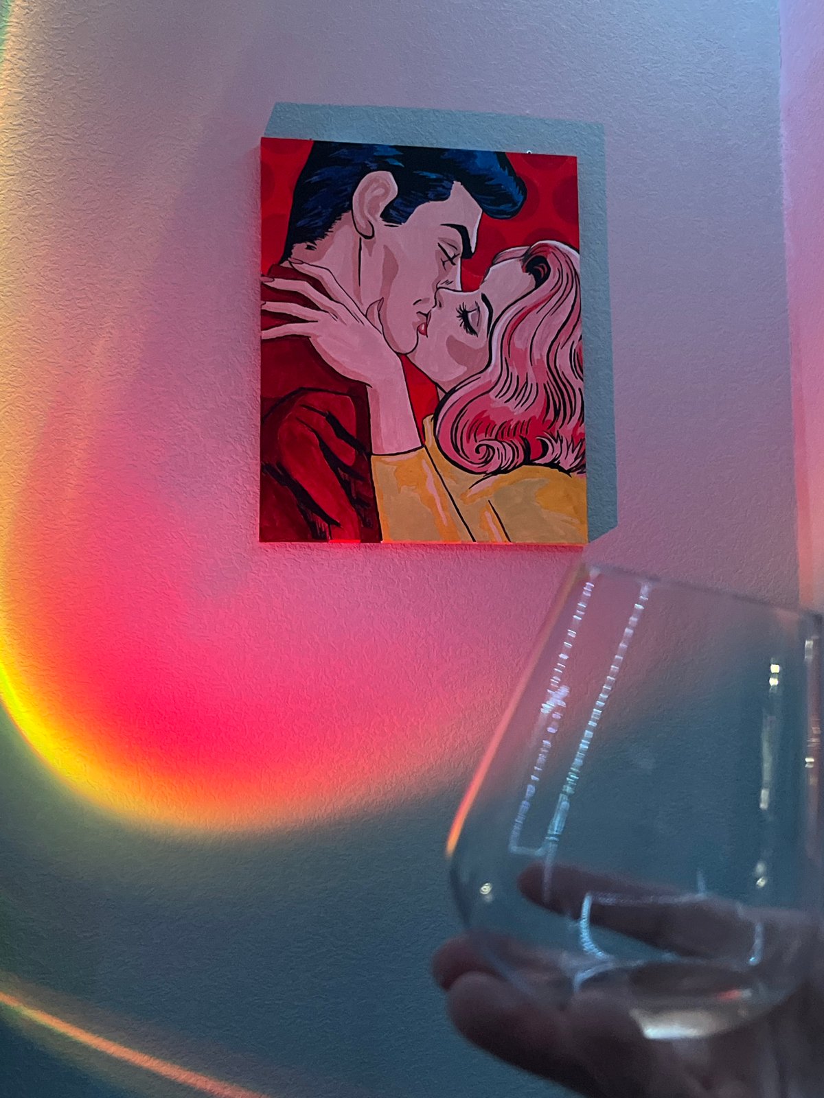 Evening gathering features art, colored lights, urban nightscape