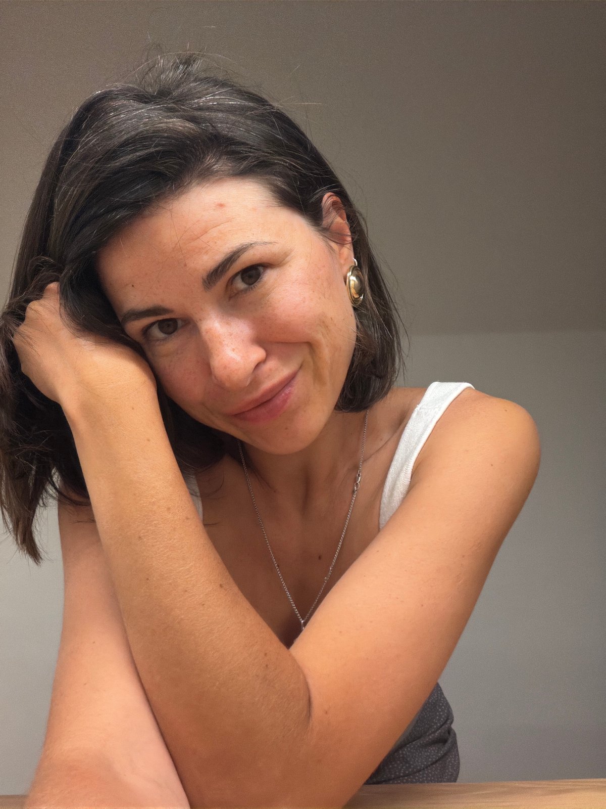 Woman poses for indoor photo session in Budva