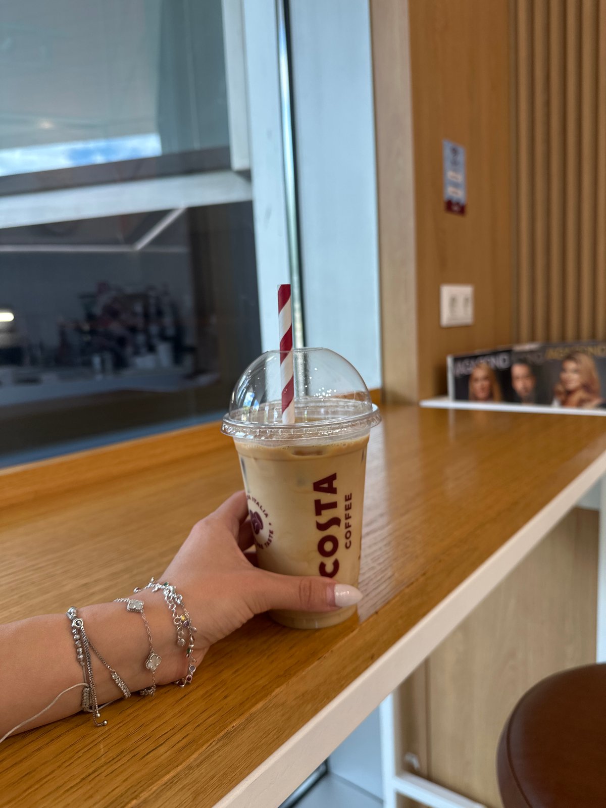Iced coffee and silver jewelry in Sofia