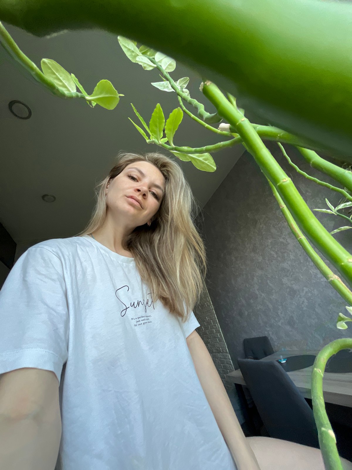 Woman takes late-night selfies with dog in Chaikovsky home