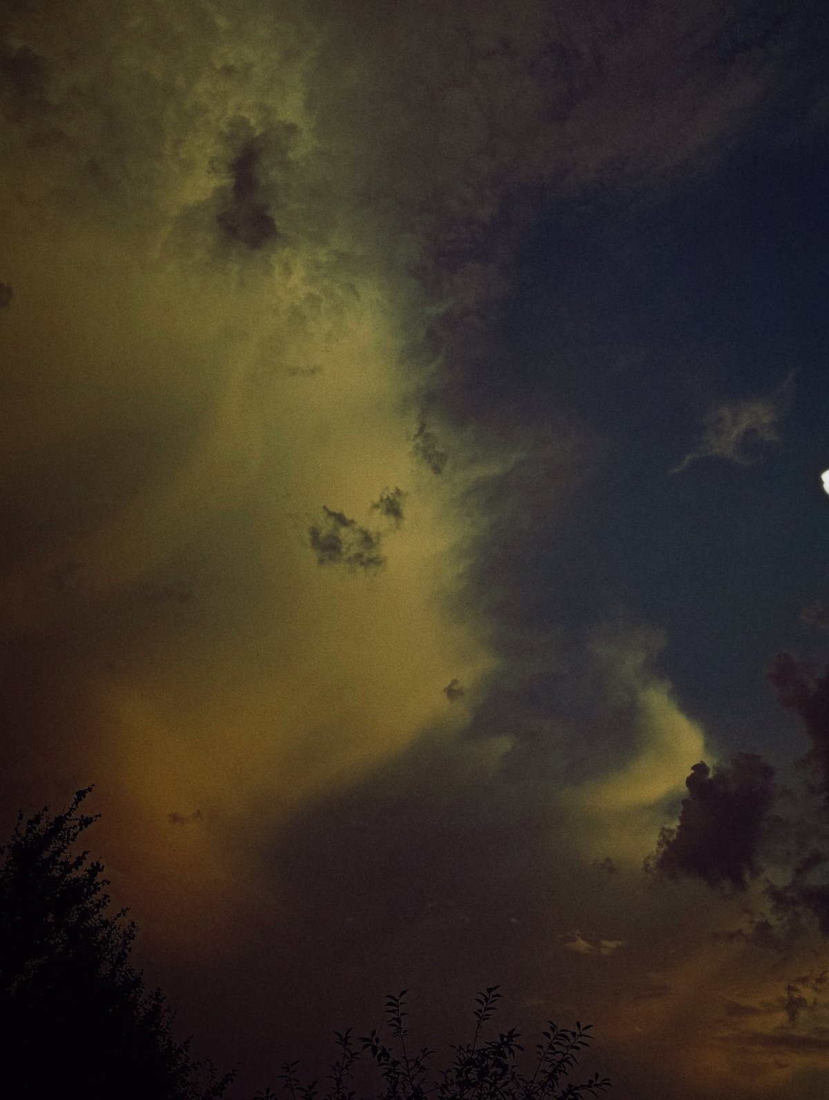 Dramatic sunset clouds photographed from multiple angles at dusk