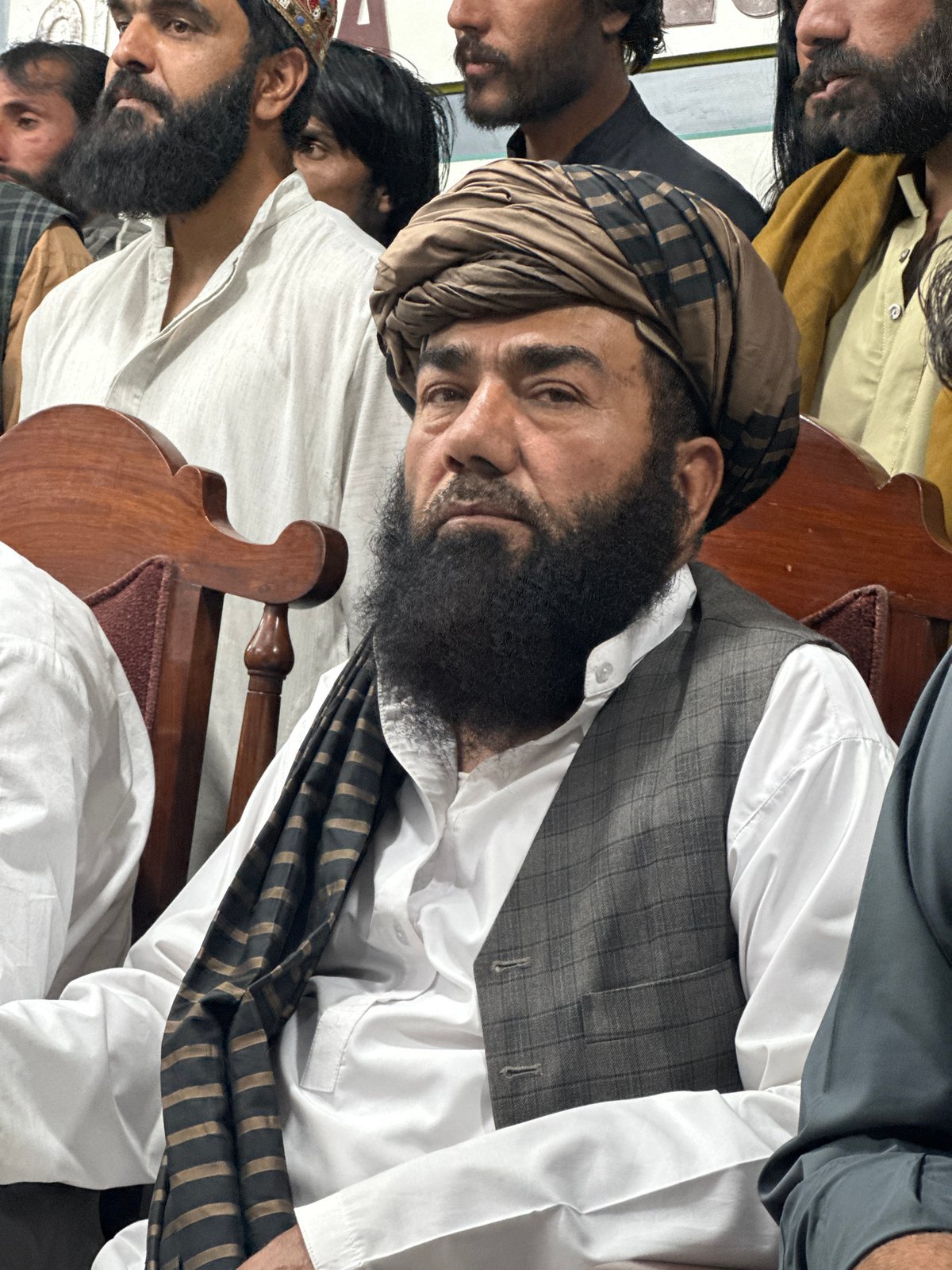 Press conference held in Quetta, Pakistan with traditional-dressed attendees