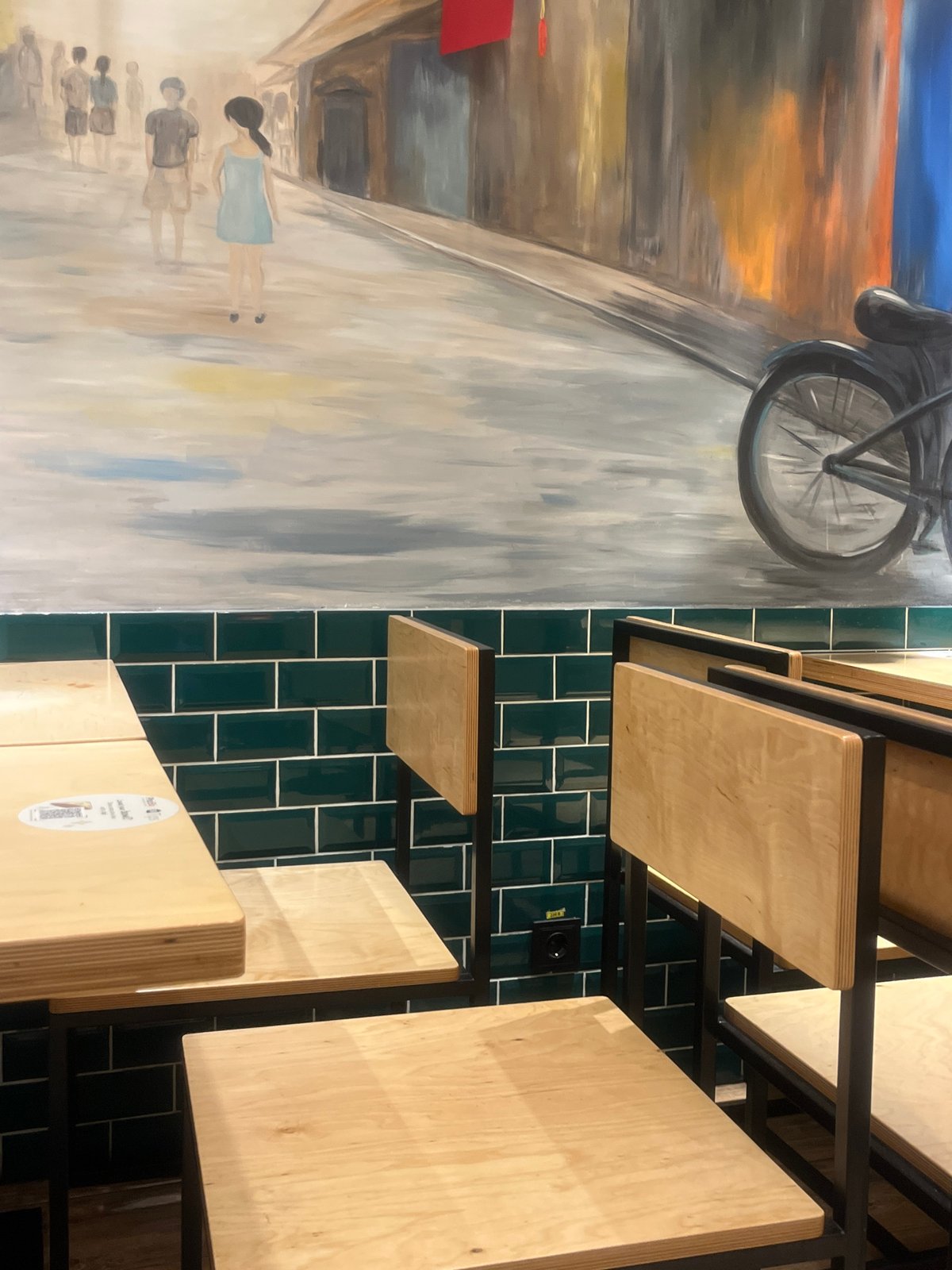 Interior scenes documented in Yerevan featuring mural and coffee packets