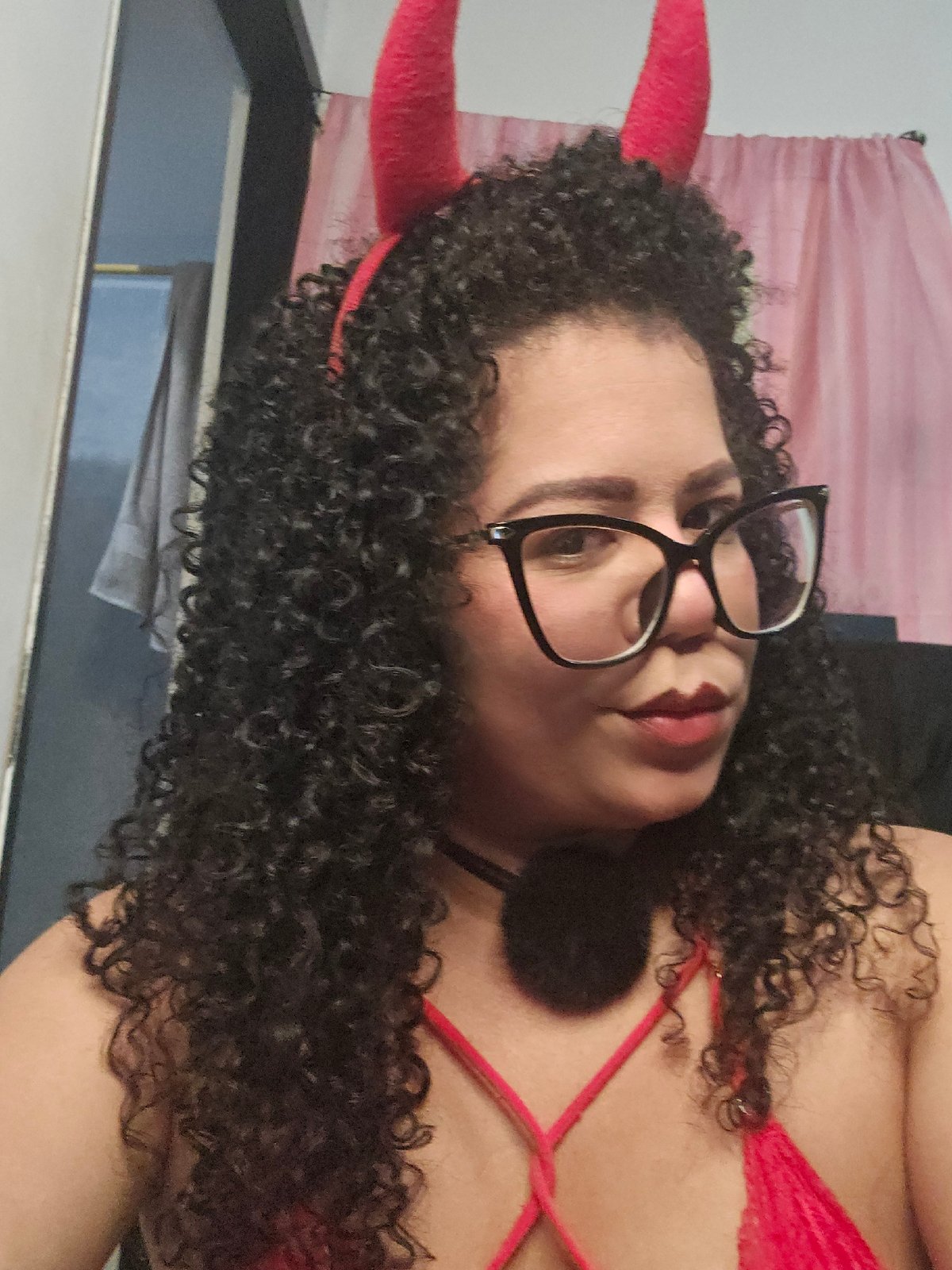 Woman poses in devil costume for photos in Cúcuta
