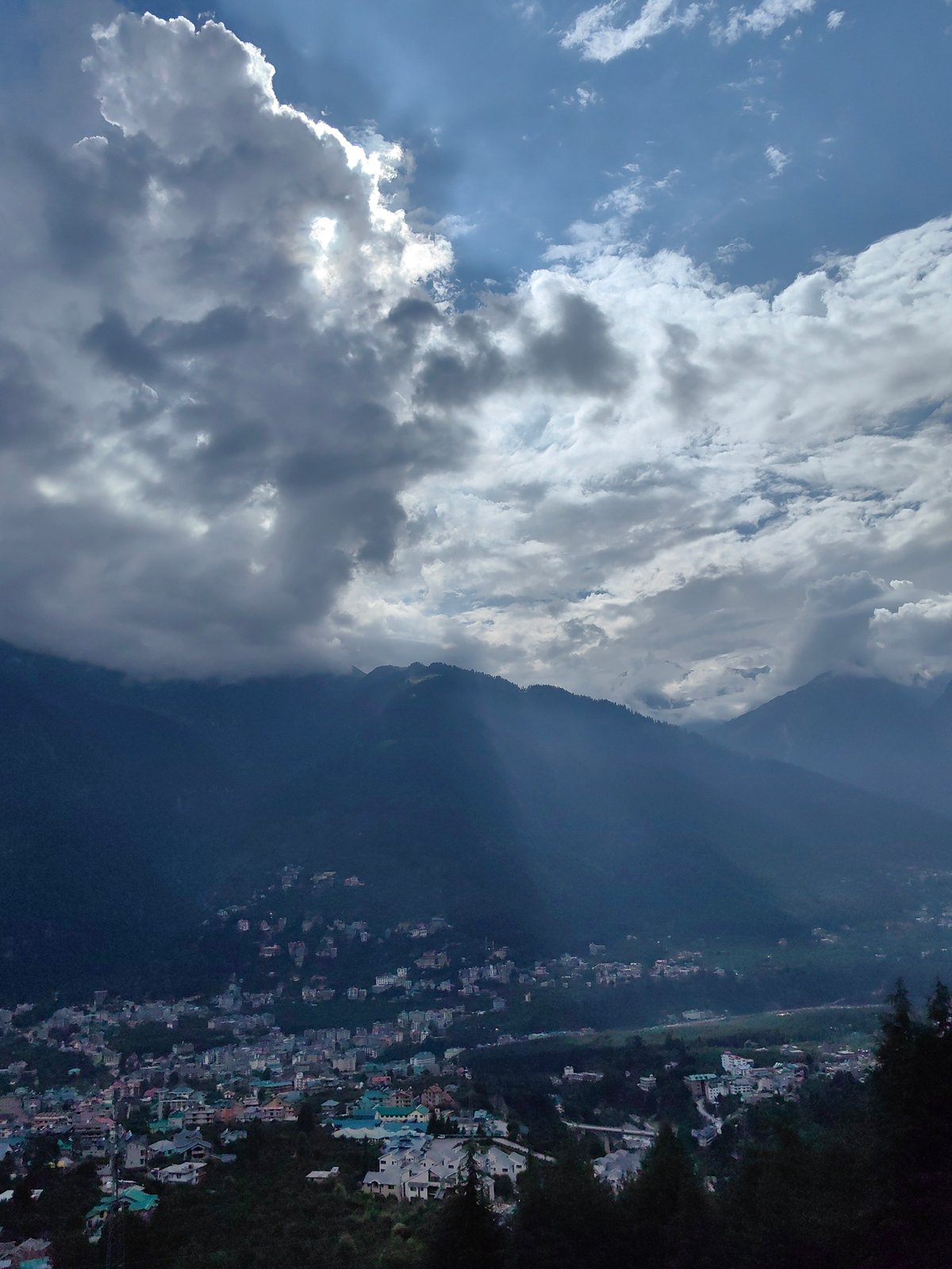 Storm skies, mountain roads, and Royal Enfields around Manali
