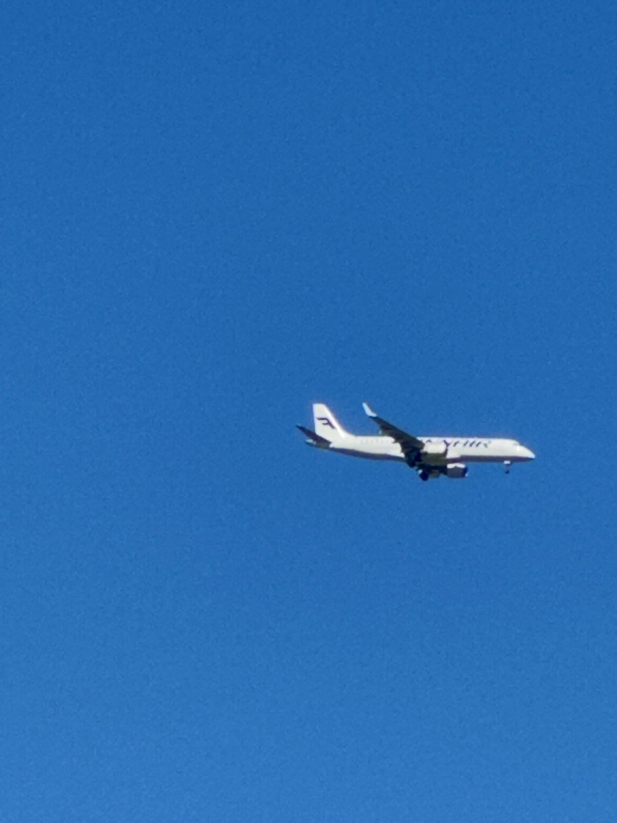 Lazy summer morning outdoors, coffee in hand, planes overhead