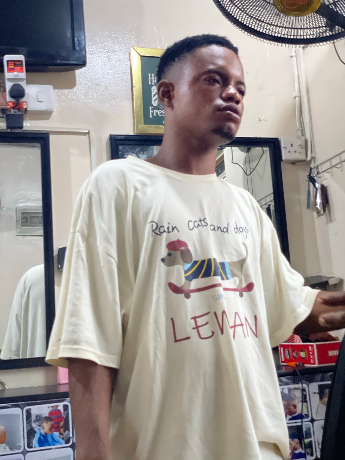 Barbershop bustles with customers getting haircuts, taking selfies in Ado