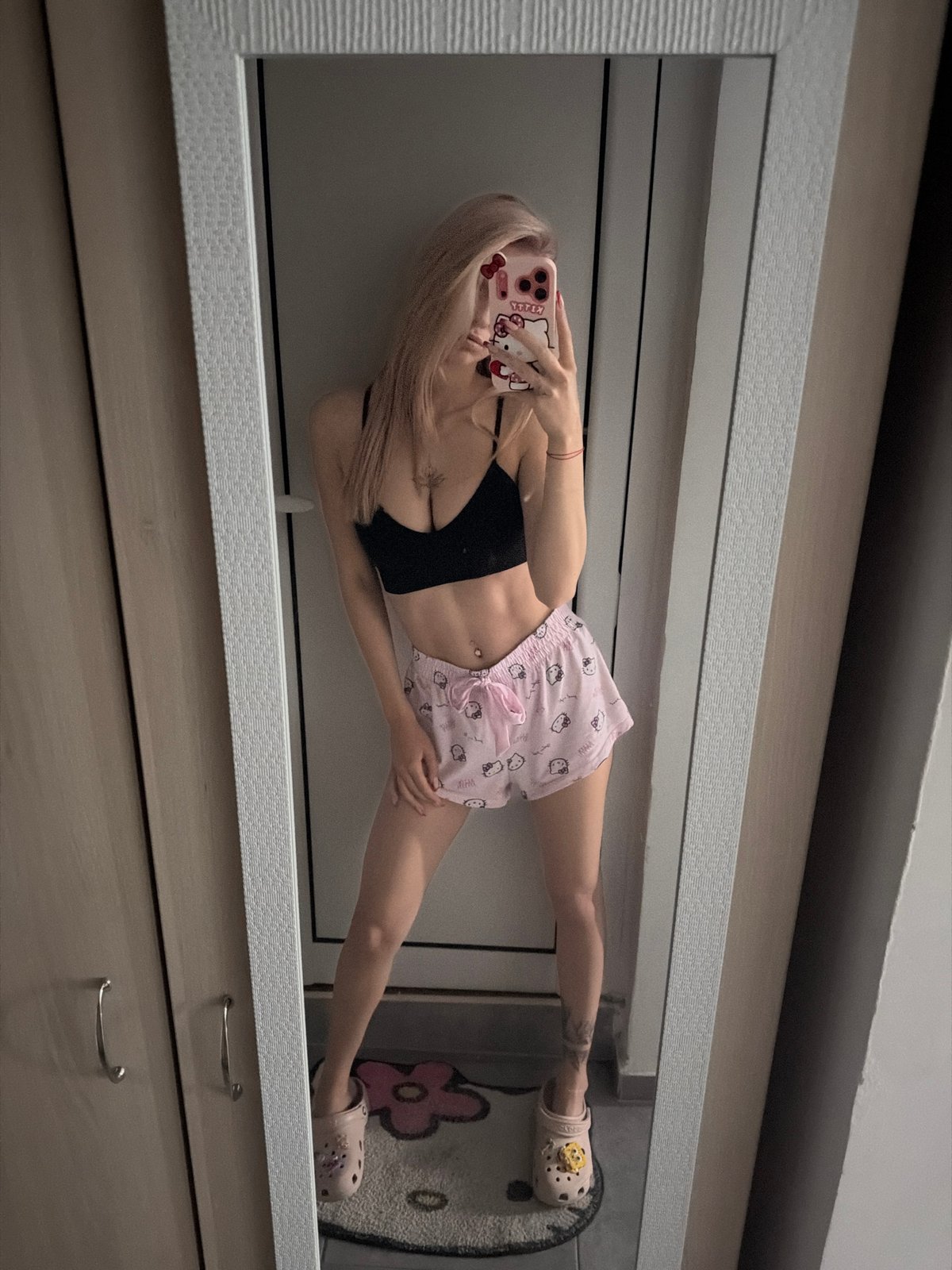 Woman Takes Selfie with Hello Kitty Phone in Sofia