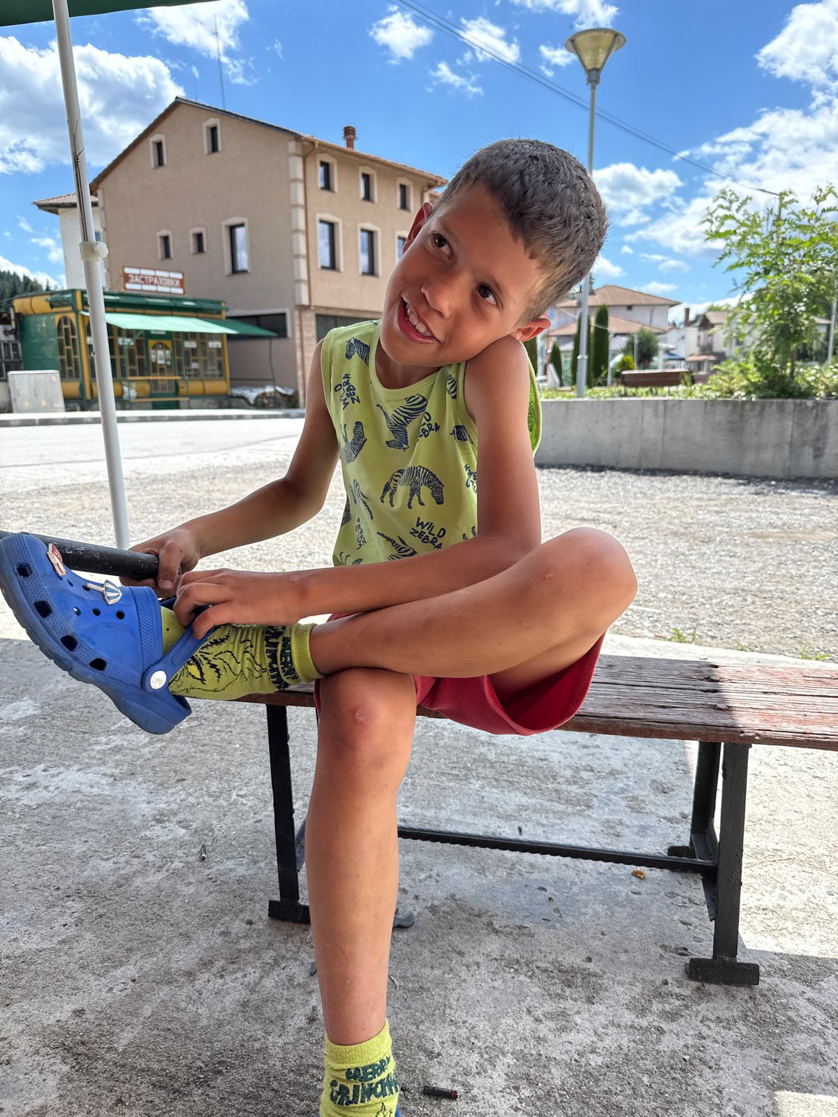 Afternoon stop at a shaded bench in Barutin's town square