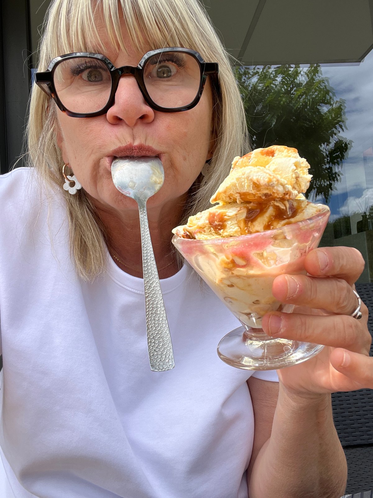 Woman enjoys birthday ice cream celebration in Chambœuf, France