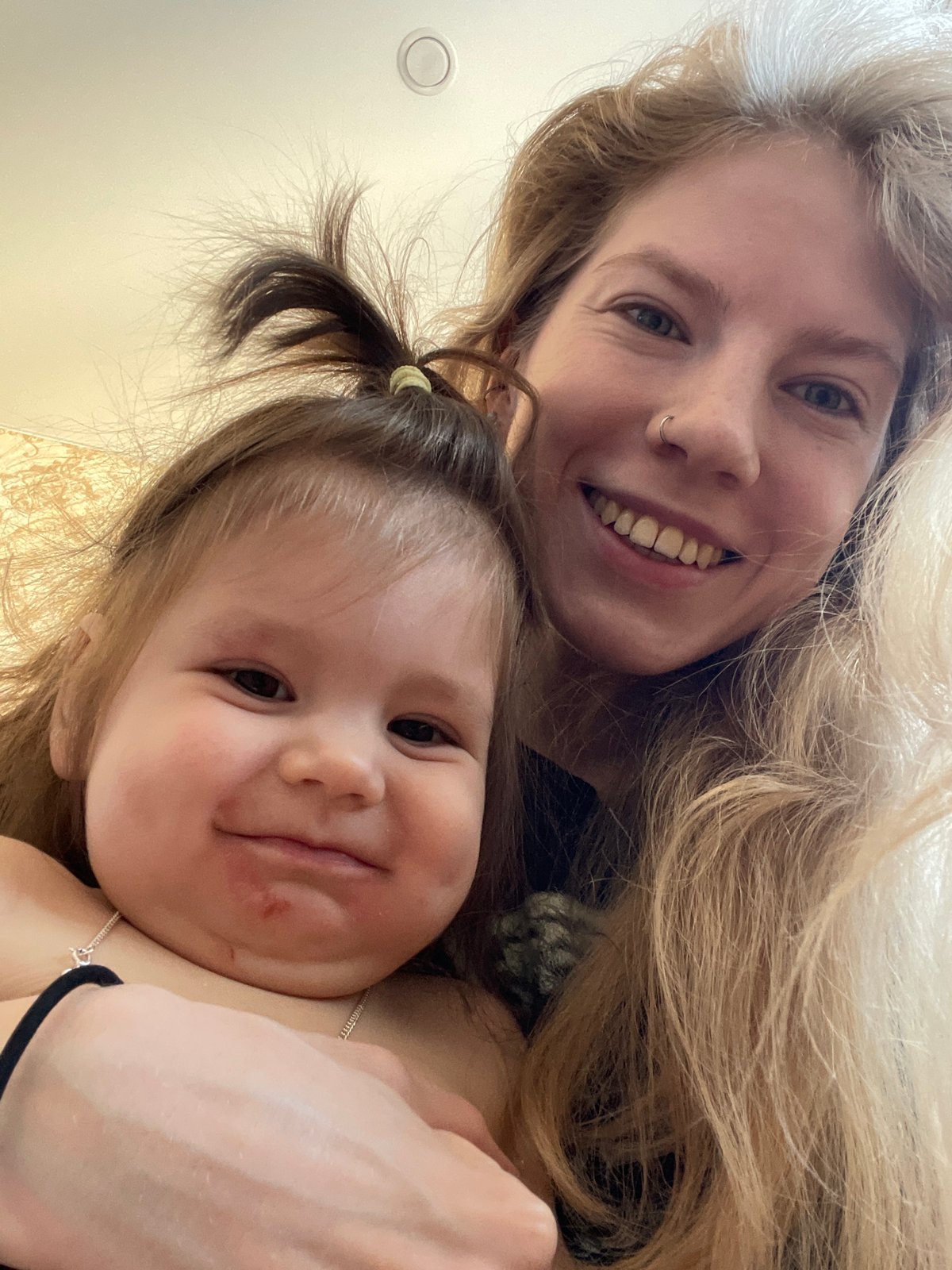 Woman takes selfie with toddler in Izhevsk