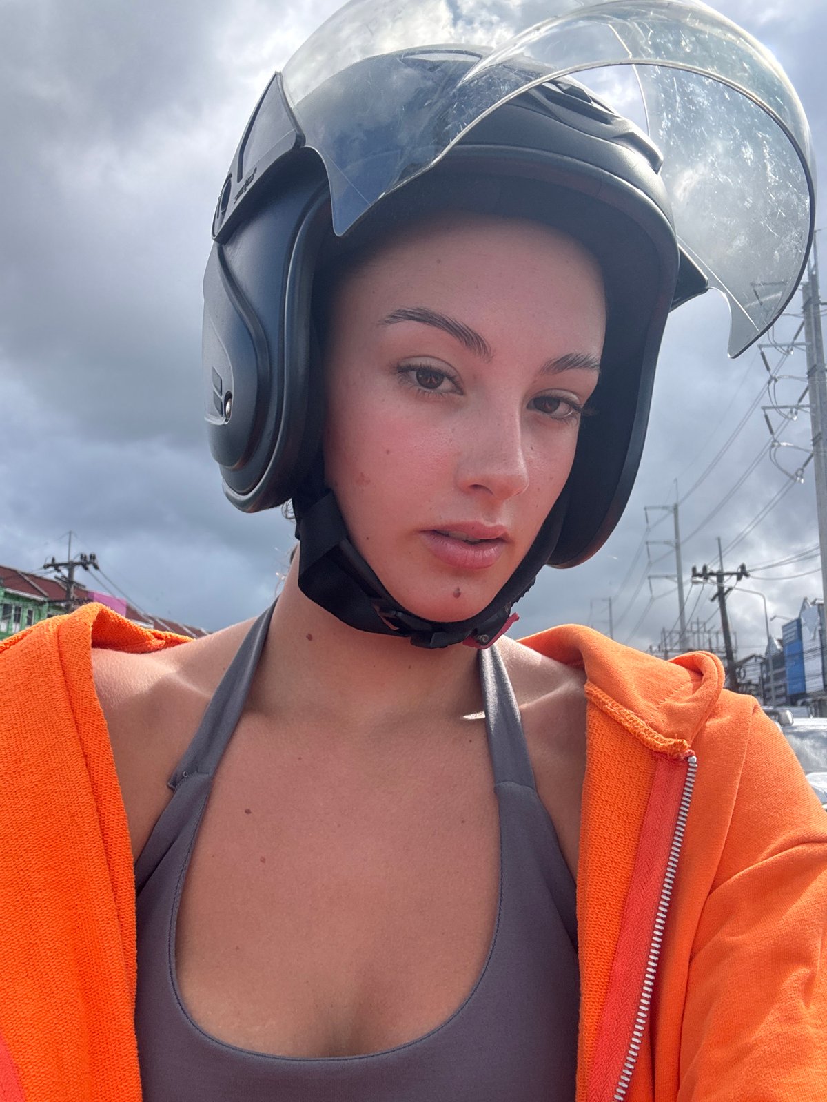 Woman in motorcycle gear photographed in Ratsada, Thailand