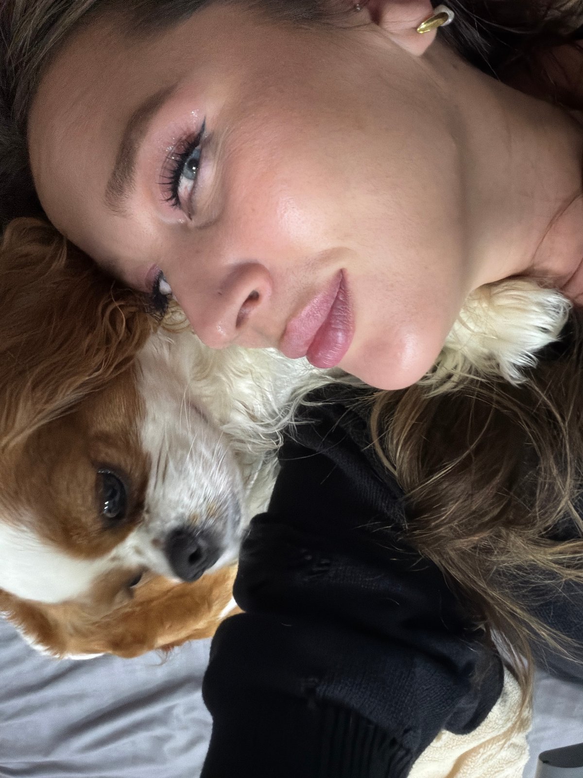Woman and dog share quiet moments in Chaikovsky home