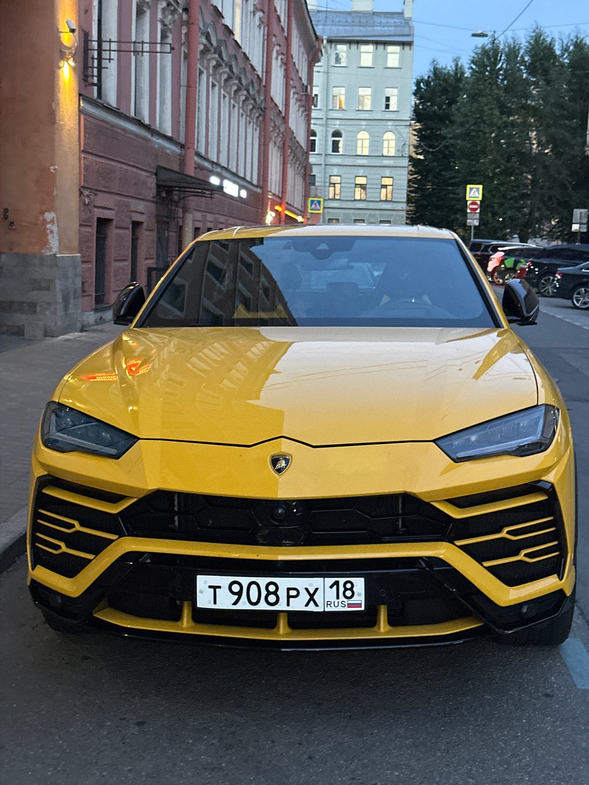 Yellow Lamborghini and a dimly lit Saint Petersburg interior, one evening.