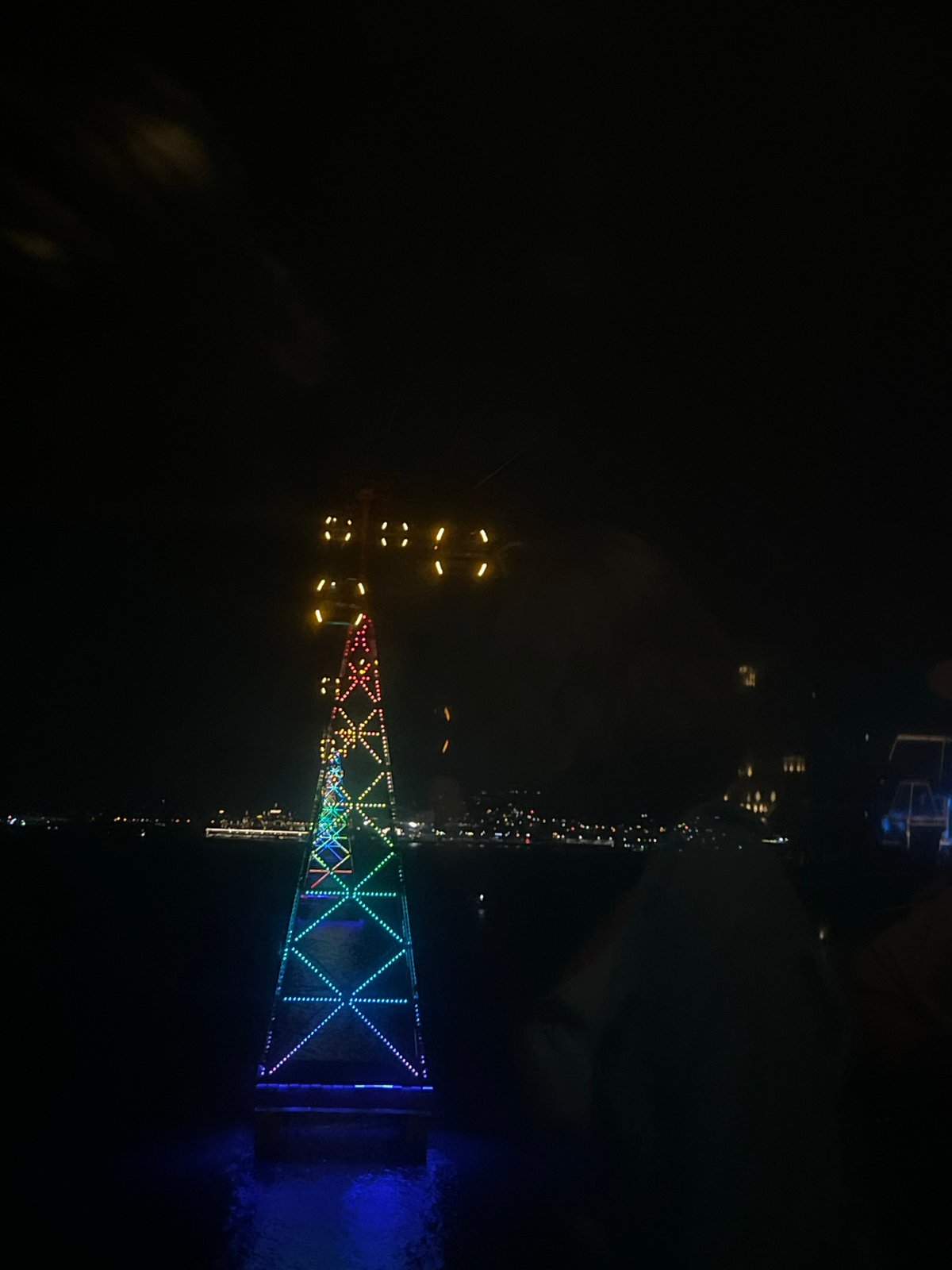 Couple views illuminated Nha Trang bridge and cityscape