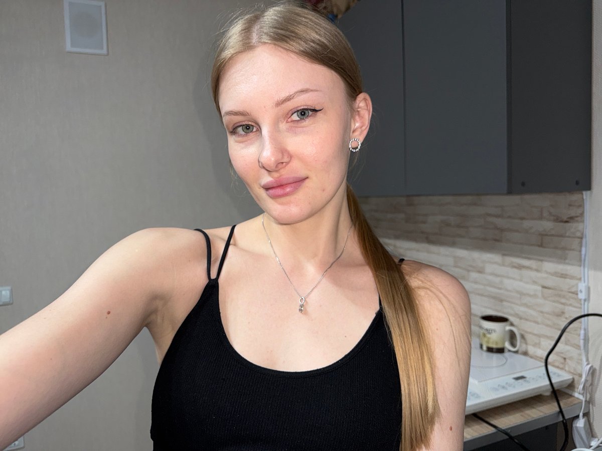 Woman documents home meal with selfies in Perm