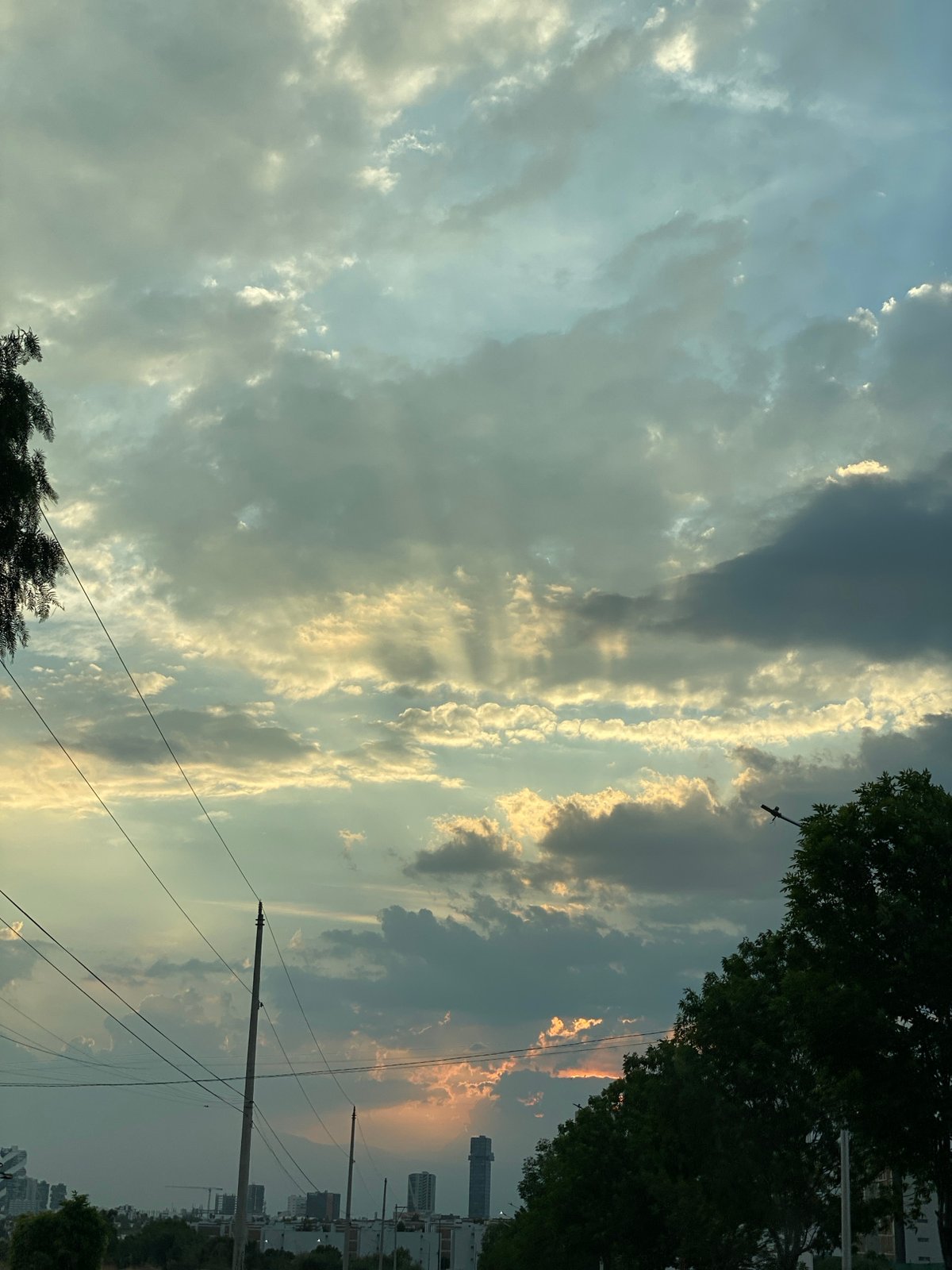 Witnesses document changing cloudy skies over city area