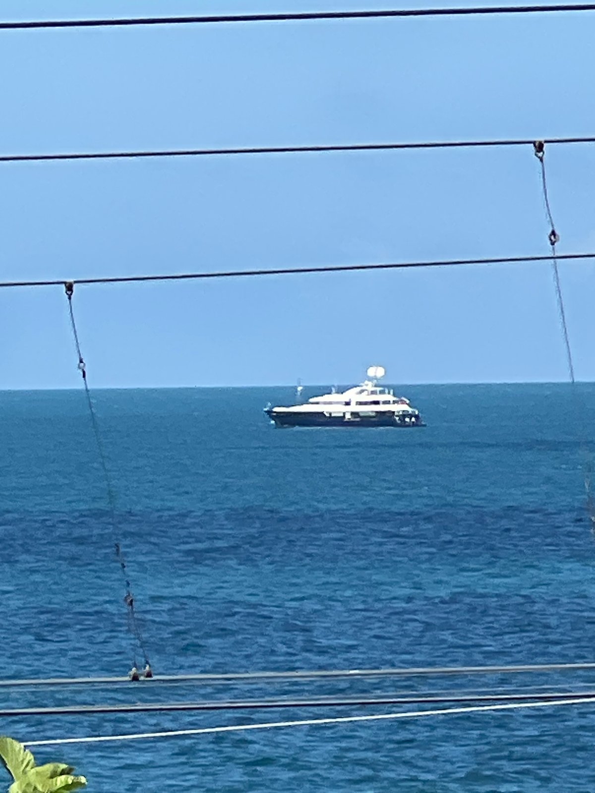 Luxury yacht and docked boat on the Black Sea near Sochi