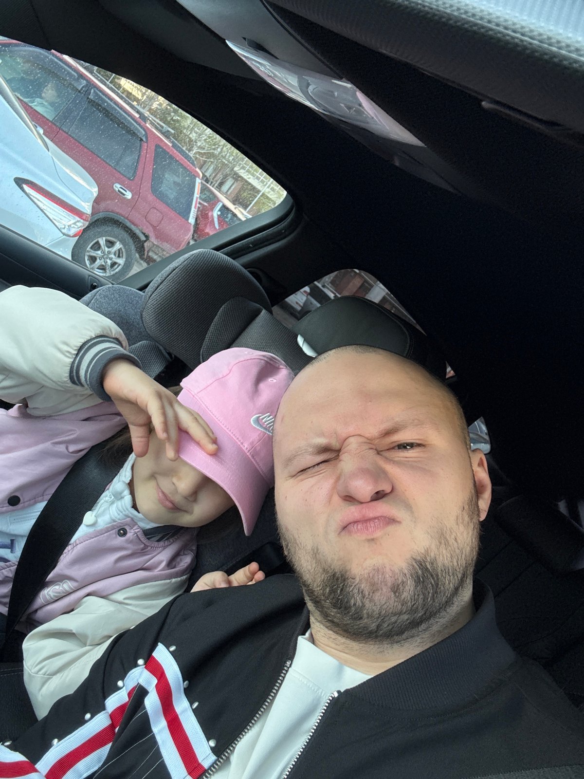Father-daughter car journey documented through Krasnoyarsk streets