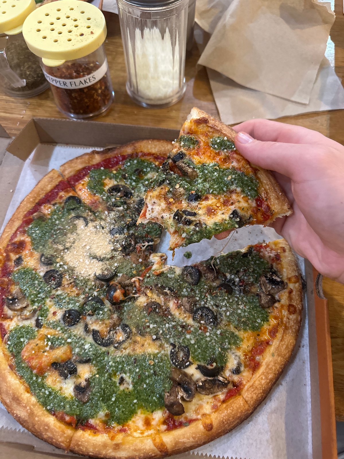 Late-night pizza dining captured in College Park establishment