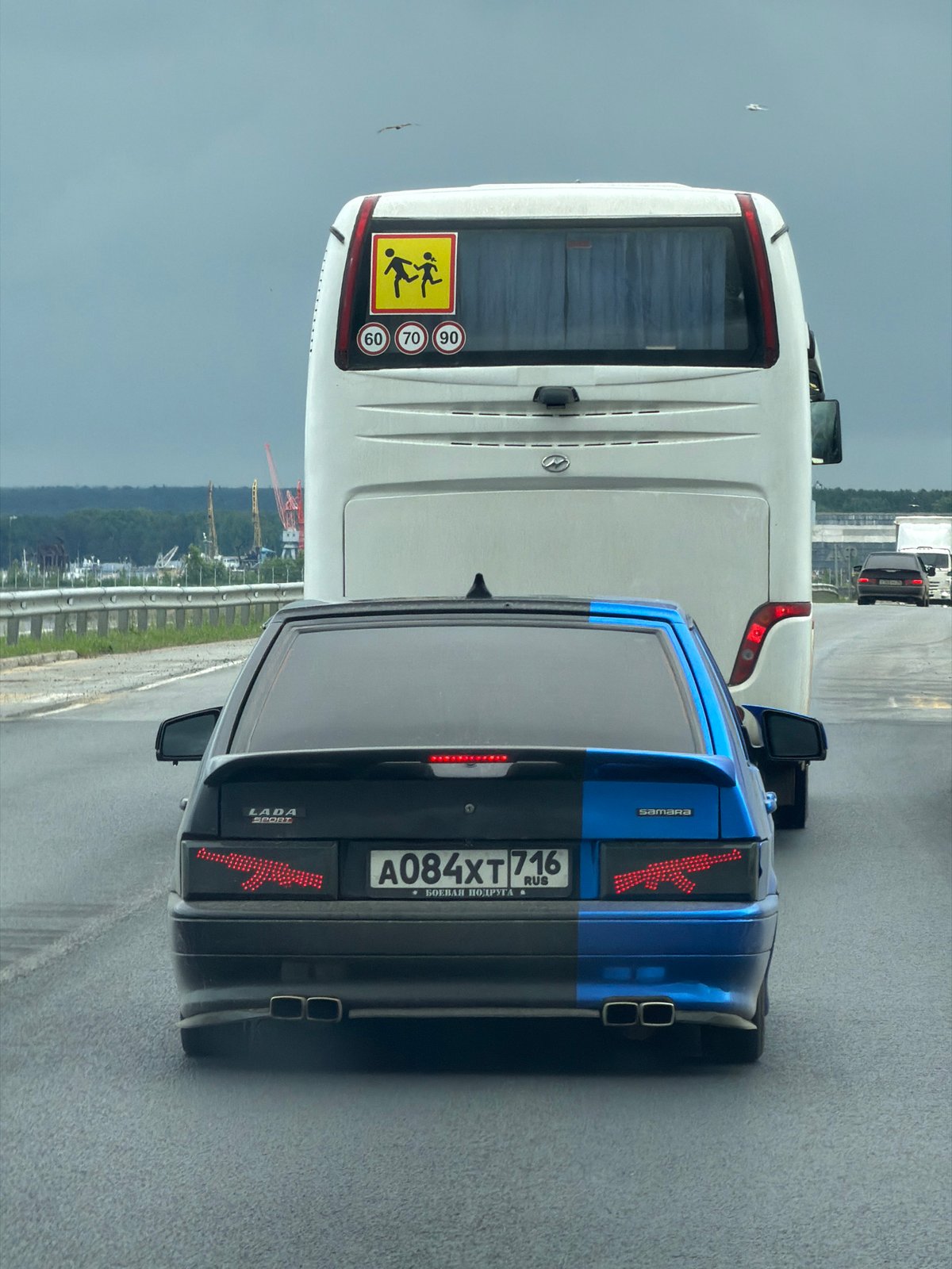 Morning traffic flows under overcast skies in Chaikovsky, Russia